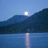 moon over mountains, water photo noaa